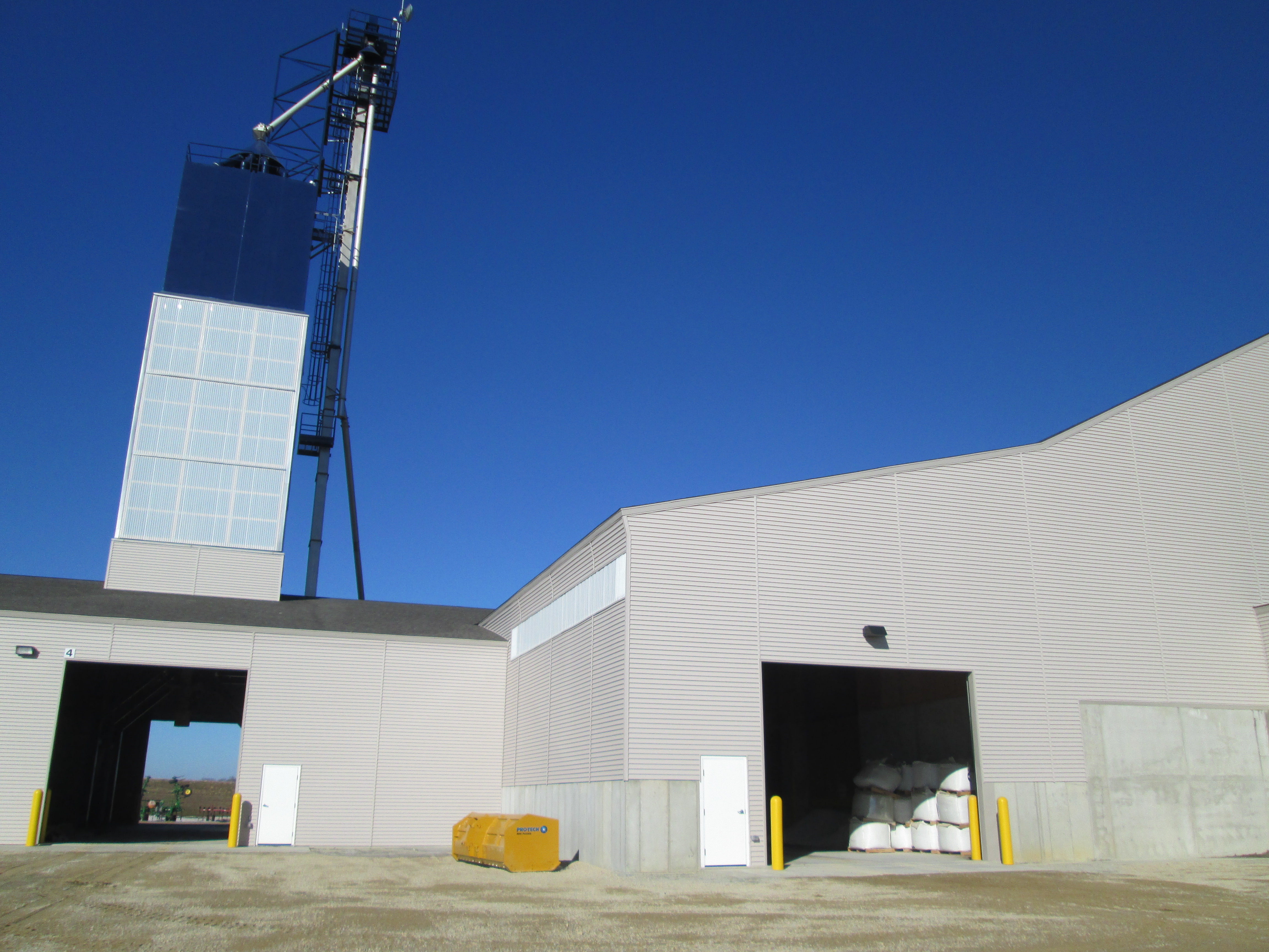 Newly constructed dry bulk fertilizer facility with load out tower.