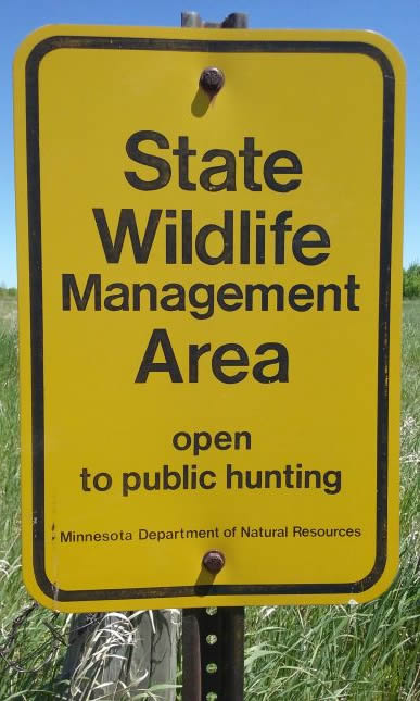 Sign reads State Wildlife Management Area open to public hunting