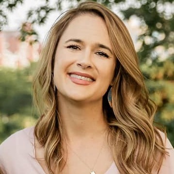 Smiling woman with long blonde hair