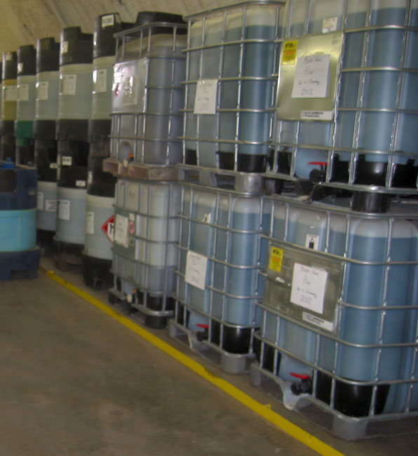 Photo shows pesticide mini-bulks being stored at a facility.  