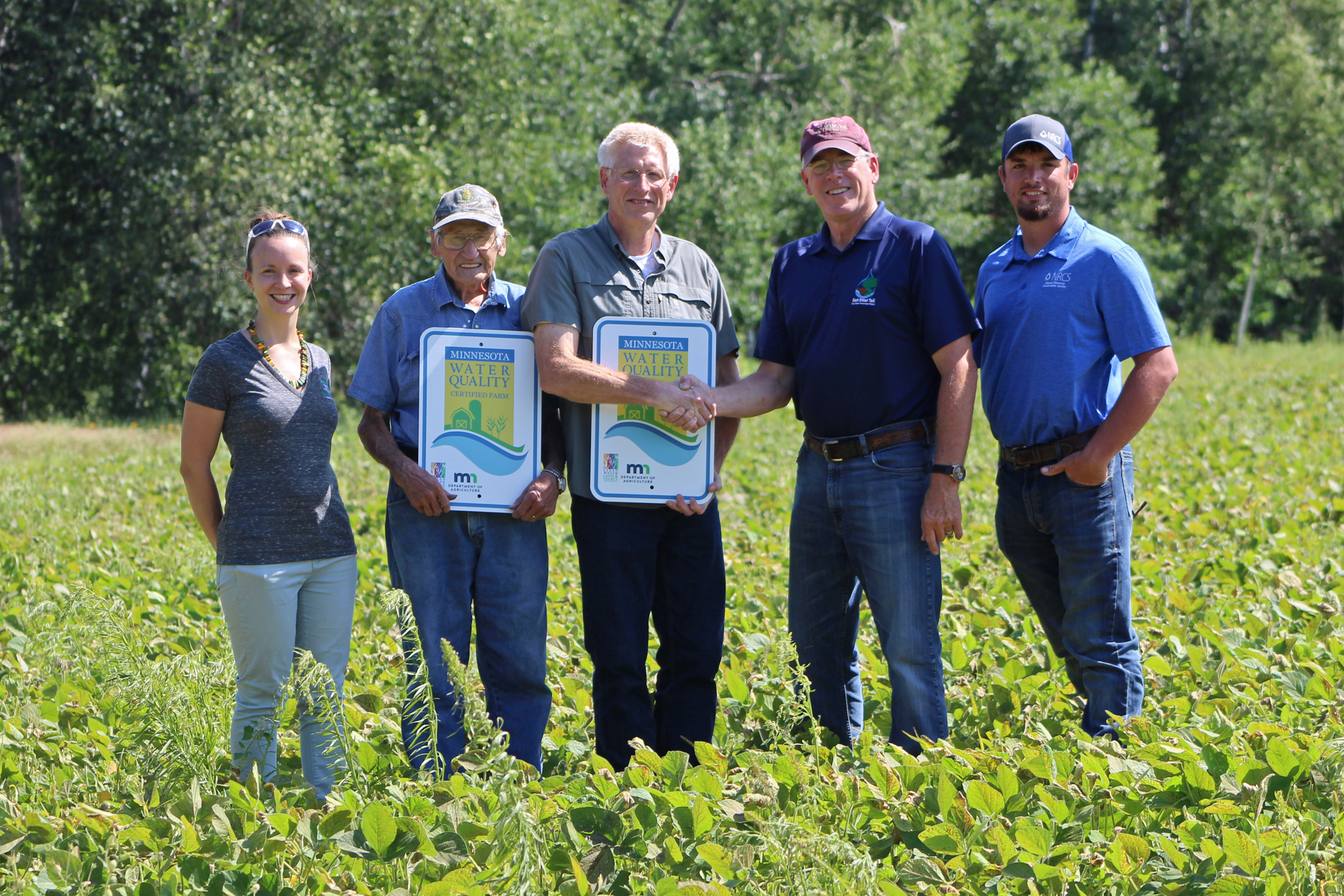 Image of MAWQCP certified producers in field