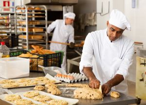 Two bakery employees working