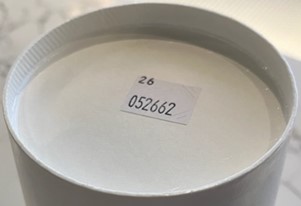 Photo showing container of Black Non-Dairy Frozen Dessent packge lot code 052662-26.