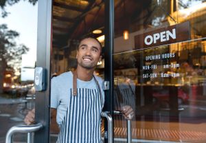 Man opening store 