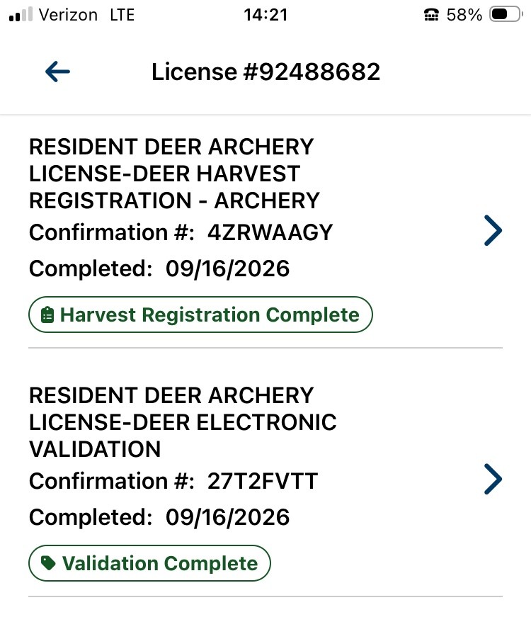 Screenshot of mobile application confirmation displaying the license number, "Harvest Registration Complete," and "Validation Complete."