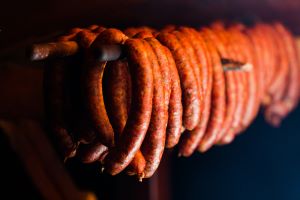 rope sausage against black background