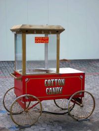  Empty red cotton candy food cart 