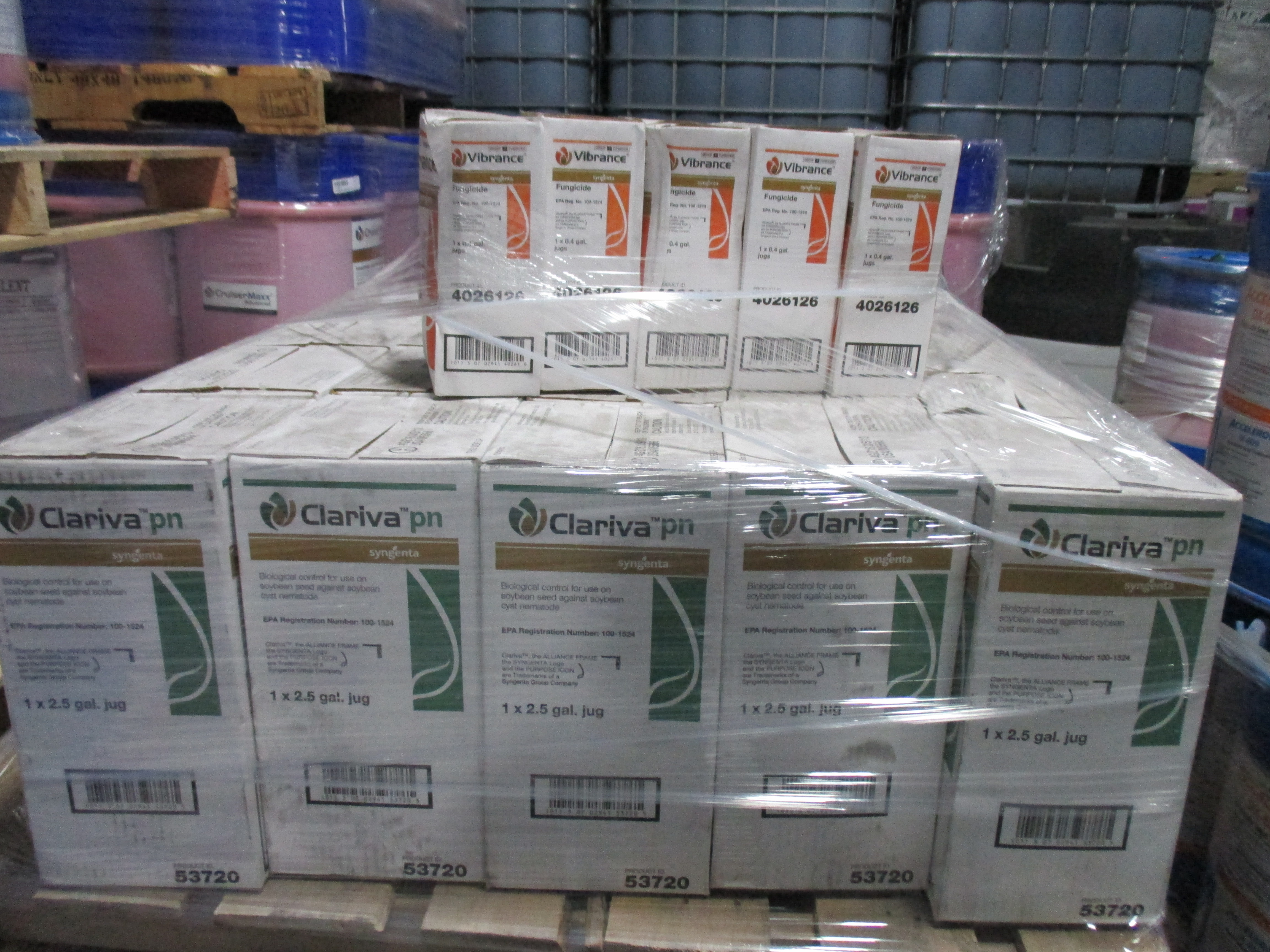 Photo shows a pallet of small package pesticides at a facility. 