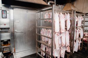 hanging meat in a smoke house
