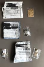 packets of seeds with packaging they were mailed in